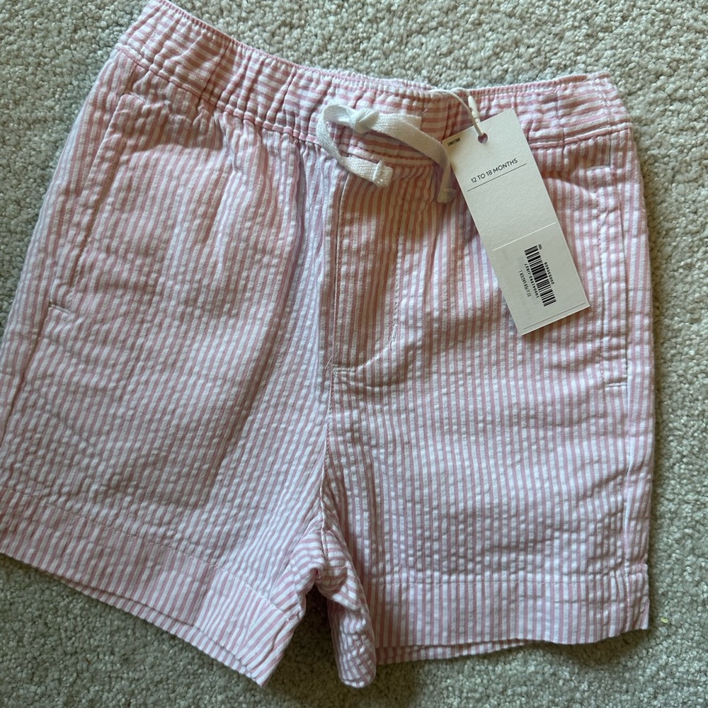 janie and Jackie baby boy pink striped shorts.